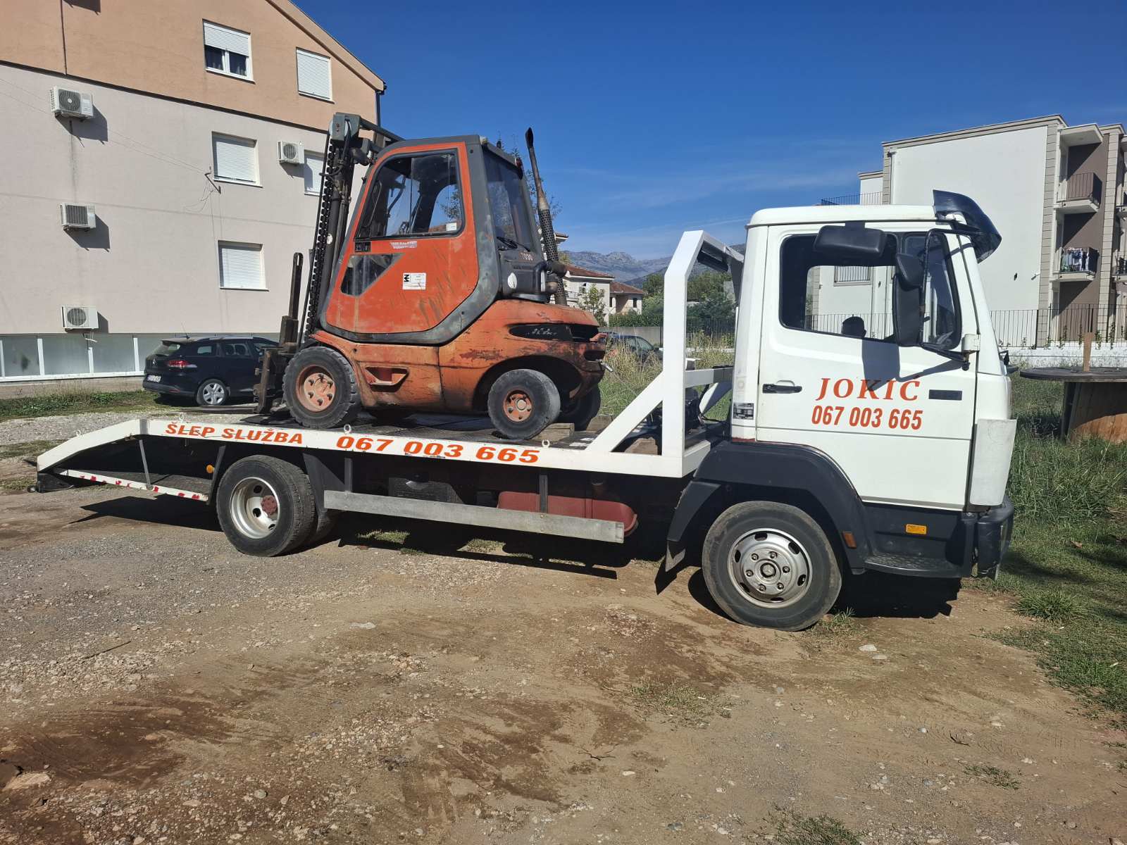 Utovar i istovar viljuškarom, iznajmljivanje viljuškara, platforme – Podgorica, Budva, Tivat, Bar, Kotor, Herceg Novi – Crna Gora078977